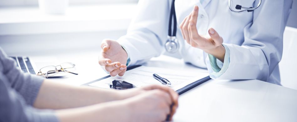 Arzt Gespräch mit Patienten