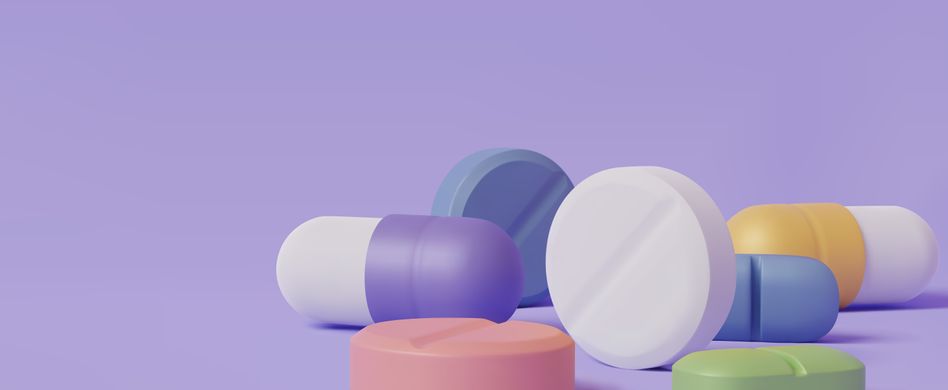medikamente pillen kapseln vor lila hintergrund